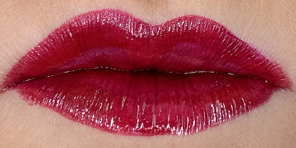 Real lip photograph of Berry Royale LipSense color recipe featuring one coat of Purple Reign and two coats of Fly Girl