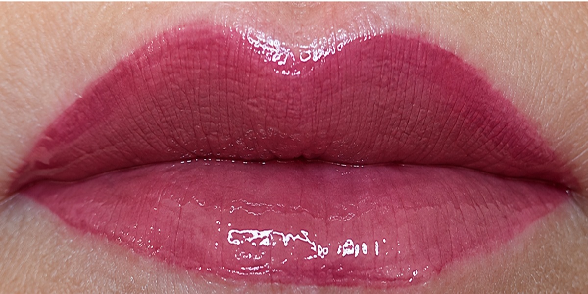 Real lip photograph showing Soft Berry Mauve created with one coat of Purple Reign and two coats of Rose Quartz LipSense
